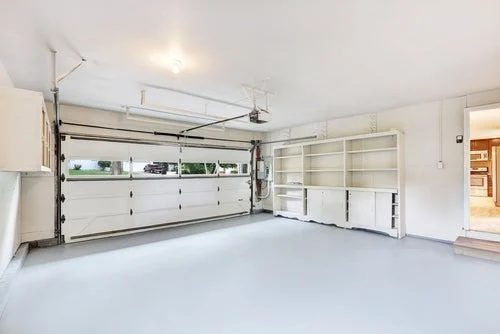 Clean garage conversion with epoxy floor