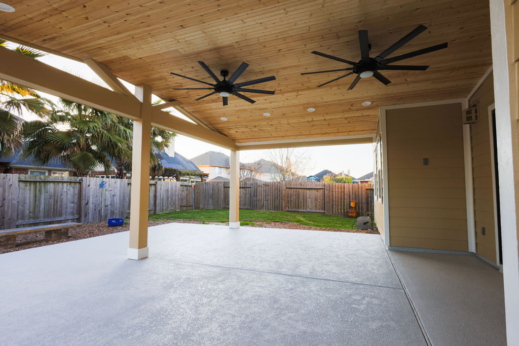 Covered patio with cedar ceiling built by EC Builders